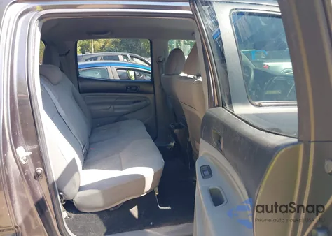 2013 Toyota Tacoma Base V6 z USA, uszkodzony, nr VIN 3TMLU4EN9DM106589